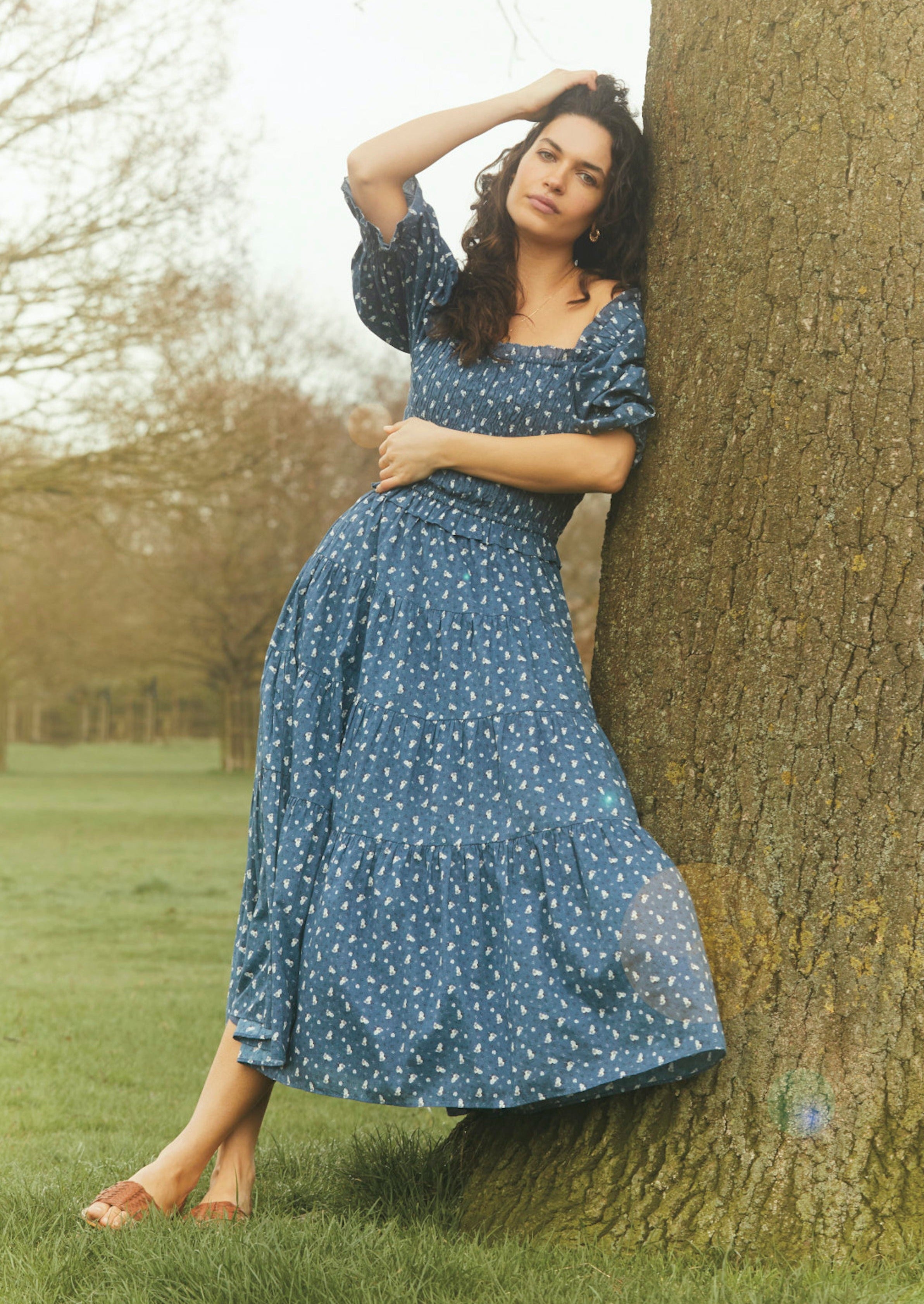 Navy blue ditsy floral puff sleeve prairie style shirred bodice